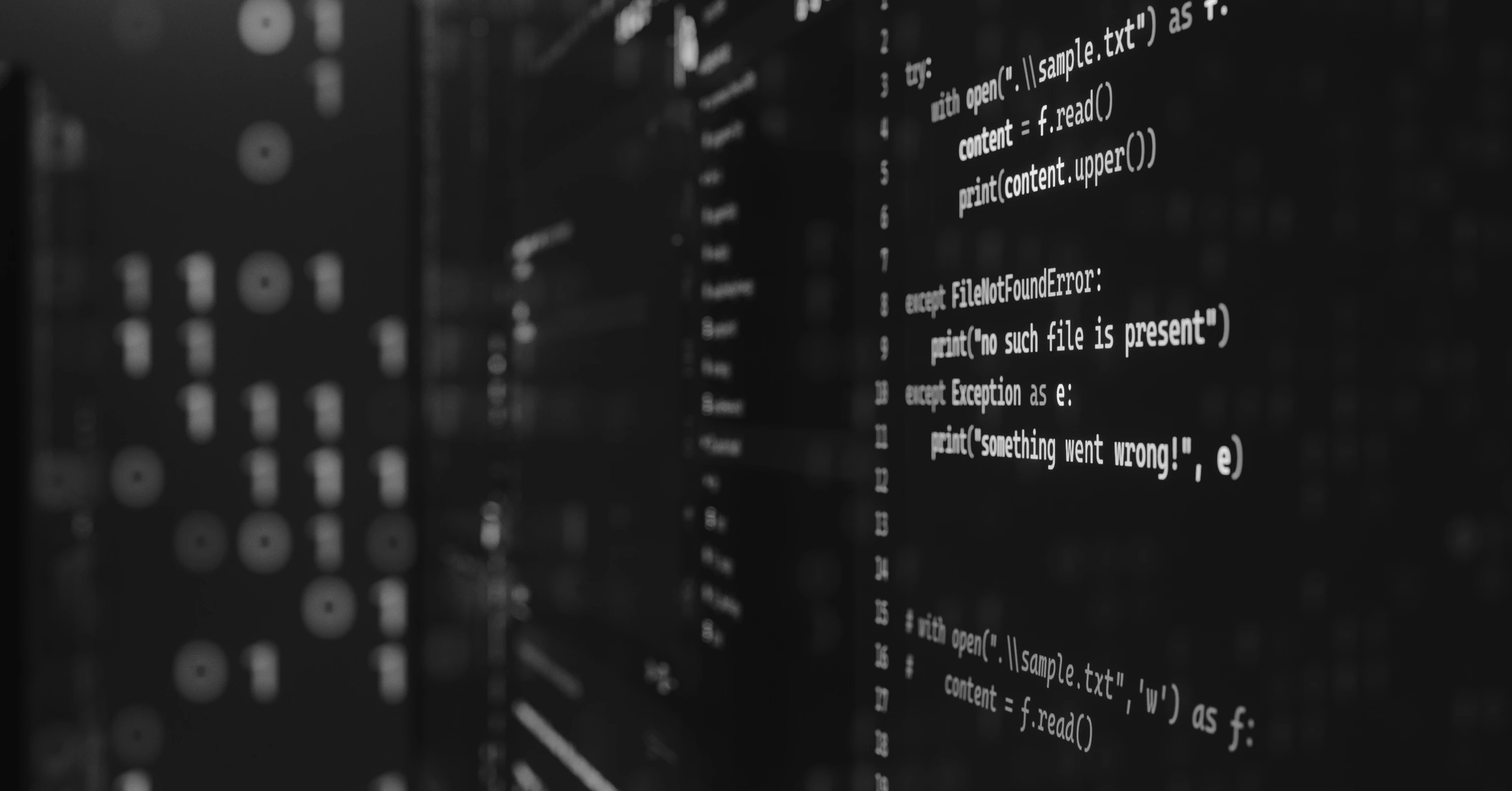 Source code on a monitor in a darkened room