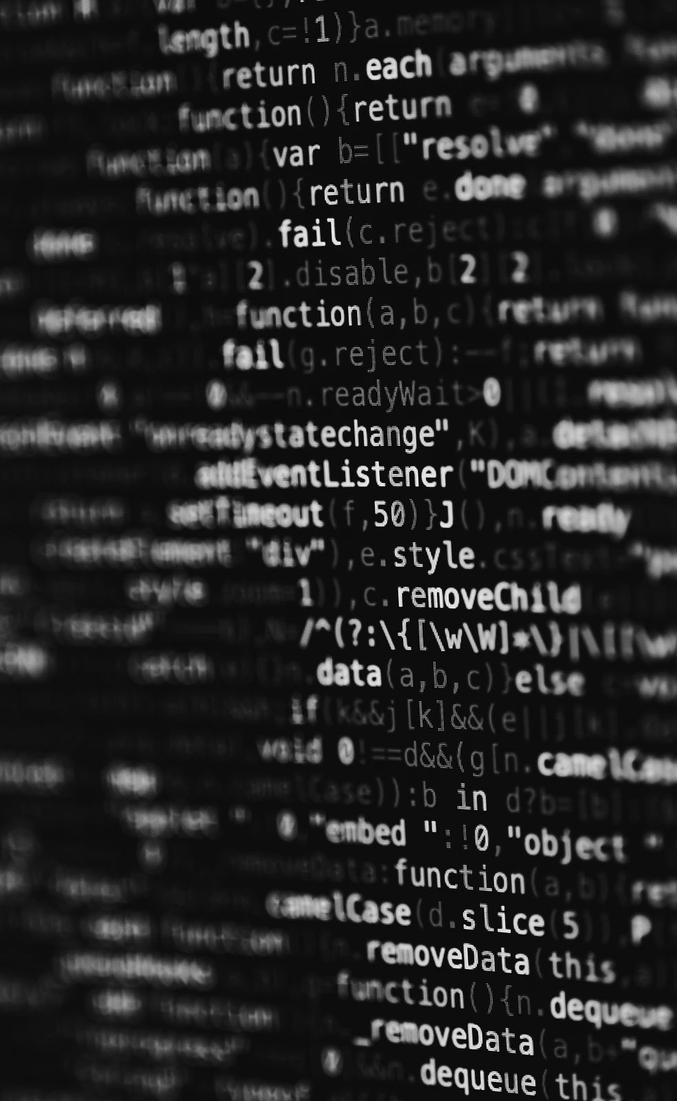 Source code on a screen, shallow depth of field